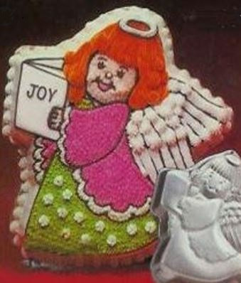 Season's greetings singing angel shaped cake